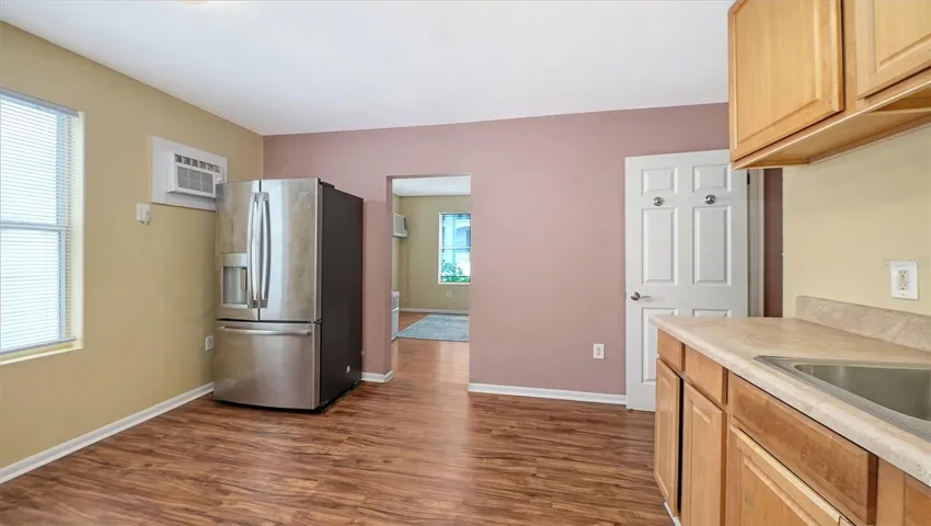 Apt #3 kitchen with range, refrigerator