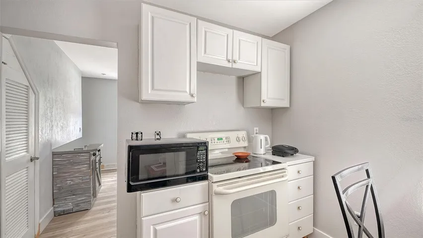 Apt #2 kitchen with range, refrigerator
