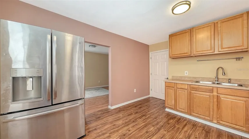 Apt #3 kitchen with range, refrigerator
