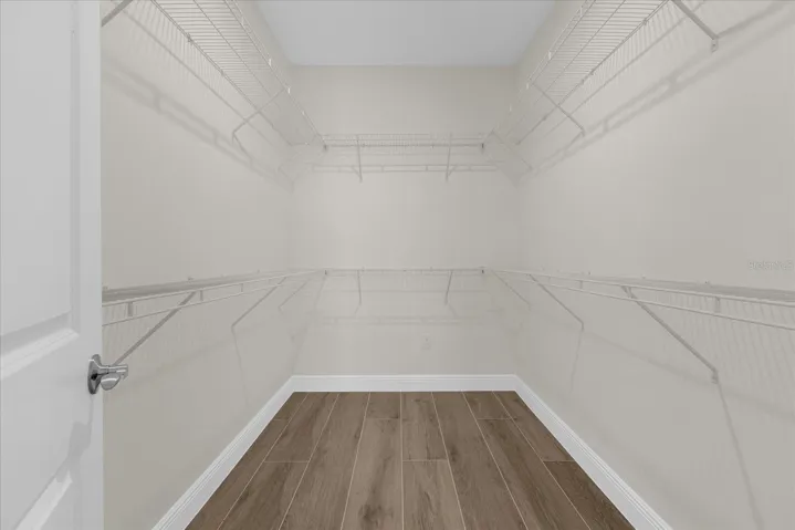 Walk-in closet in Primary Suite