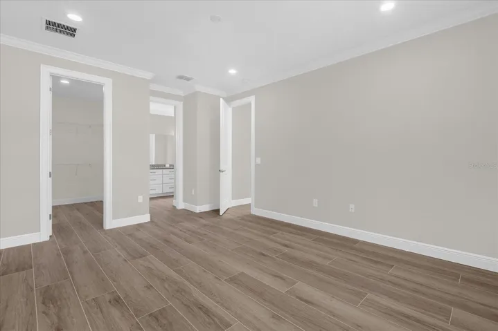 Primary suite with bathroom and walk in closet