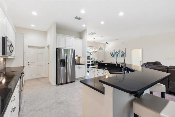 Doorway to left leads to garage, doorway to right leads to laundry room.