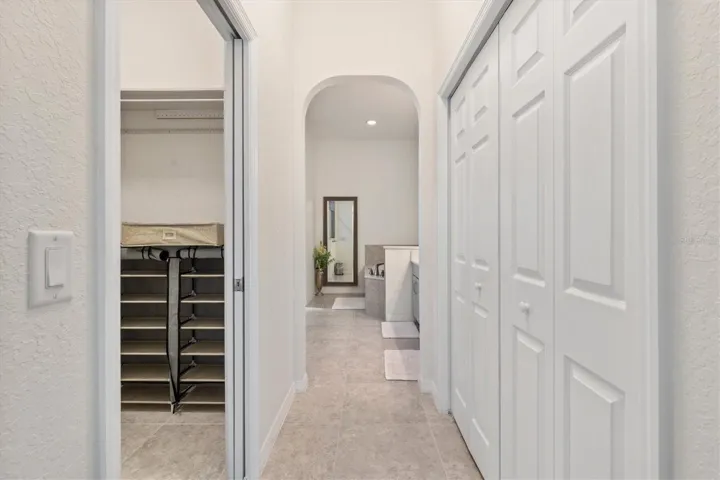 Oversized walk-in closet to the left, oversized linen closet.