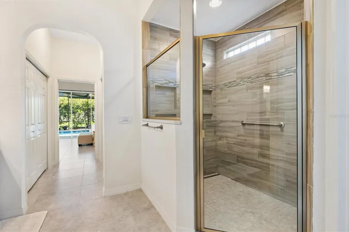 Large walk-in shower in primary.