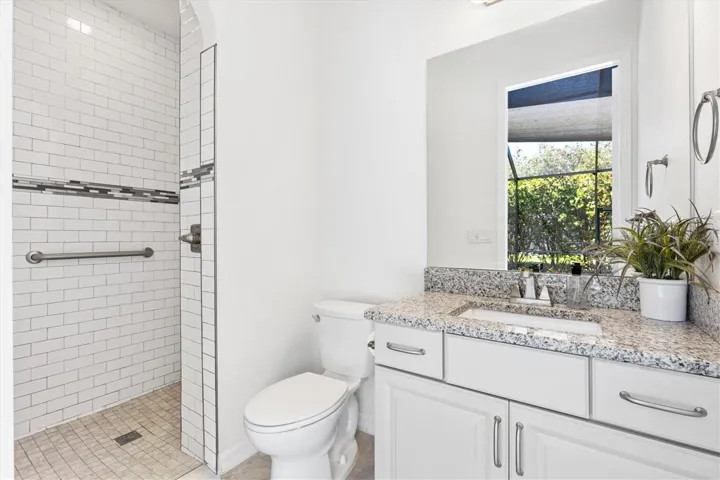 Outside full bathroom off pool area.