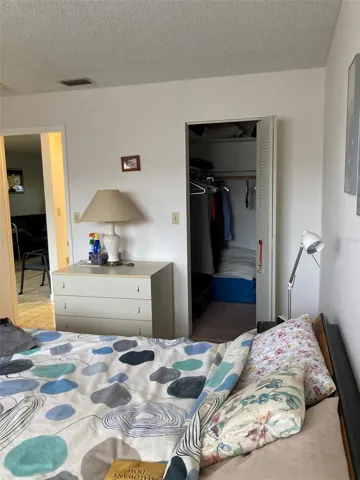 Bedroom with walk in closet