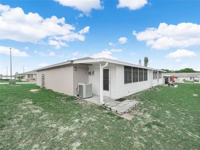 Back patio and enclosed screen porch