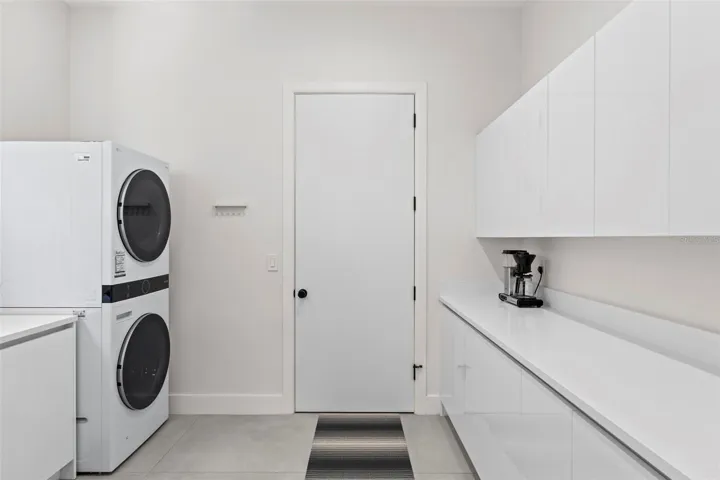 Laundry Room toward the Attached Two Car Garage