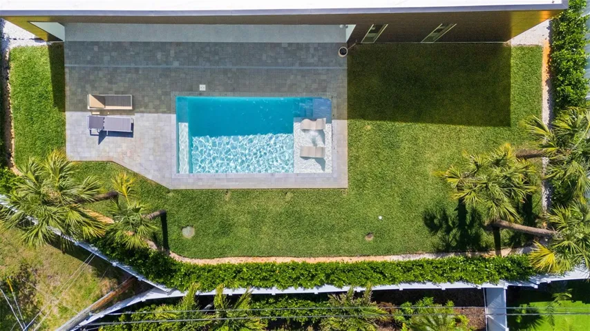Pool With Sun Shelf And Plenty Of Green Space In Your Fully Enclosed Private Oasis