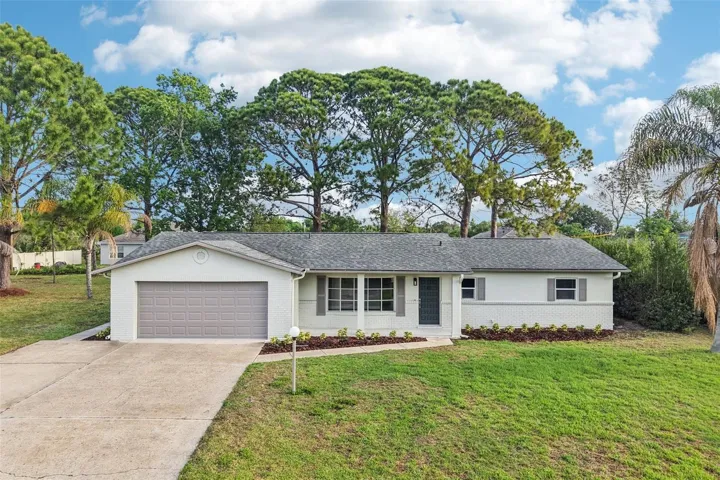 The BRAND NEW ROOF (2026) and full RE-PIPE (2026) headline this COMPLETELY UPDATED ~ MOVE-IN READY home in the heart of Deltona Lakes – where modern upgrades meet a spacious layout with NO HOA!