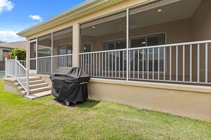 Weber 4-burner grill included with the sale of the home.