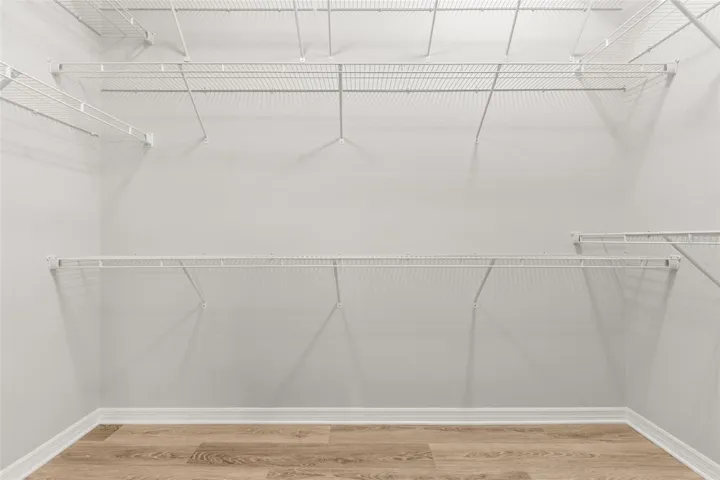 Primary oversized walk-in closet