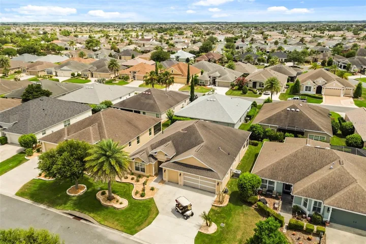 Aerial view of home and surroundings