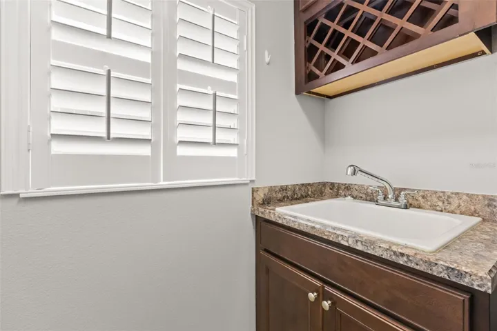 Sink  wine cabinet in laundry room