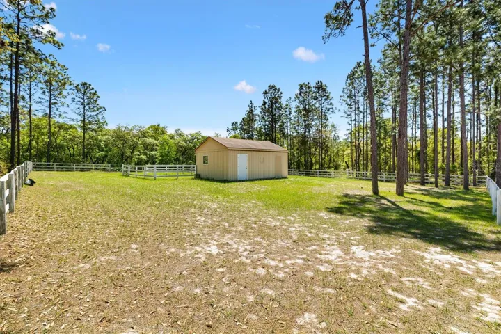 Virtually staged 2 stall barn 15'x24'. Fenced pasture 125'x140'.
