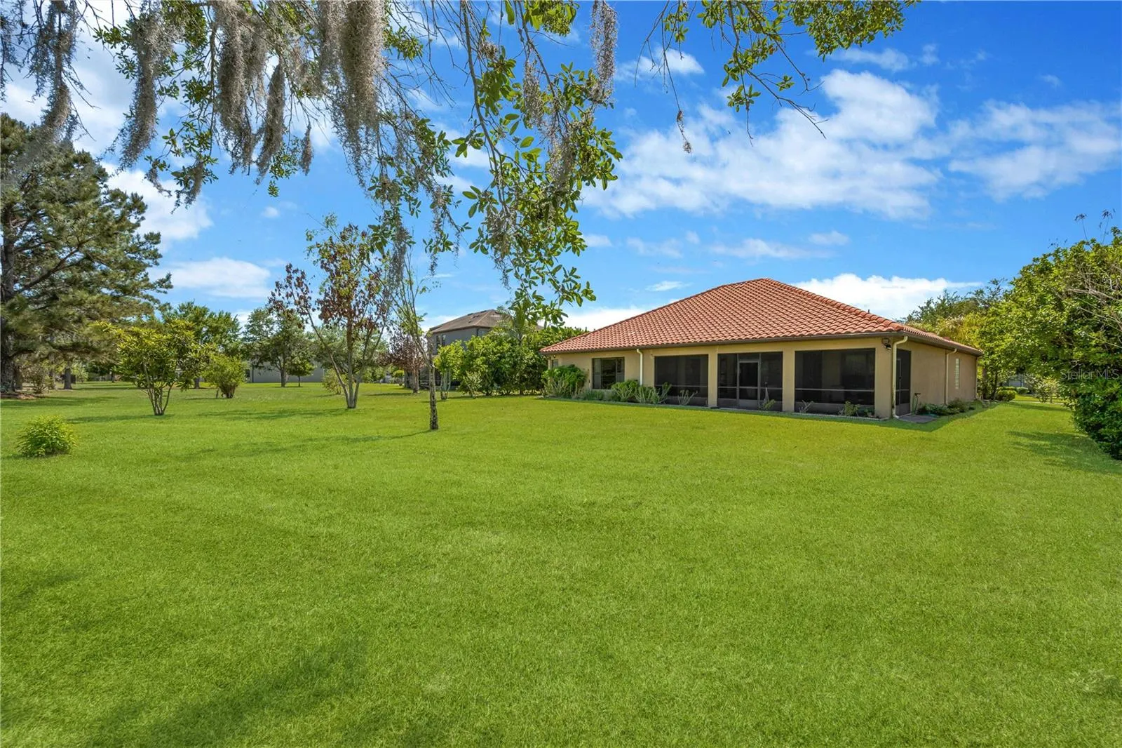 This east-facing yard offers abundant morning sunshine and plenty of space to design the pool and backyard oasis of your dreams.