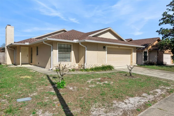 Move-in ready single-story with covered entry, and two-car garage