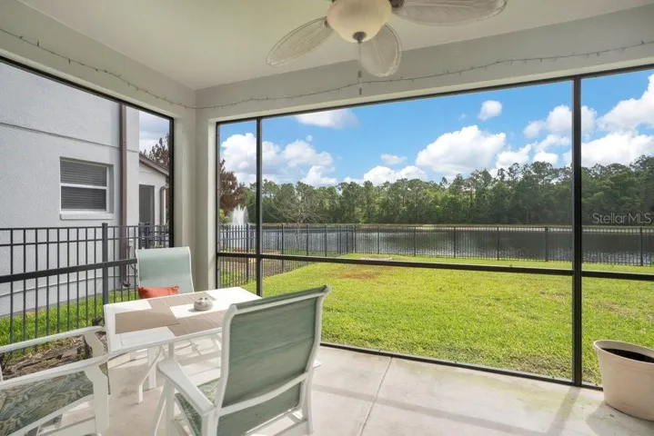 Step outside to the covered, screened patio and FENCED BACKYARD, where TRANQUIL POND AND CONSERVATION VIEWS create a serene backdrop—ideal for relaxing evenings or weekend gatherings.