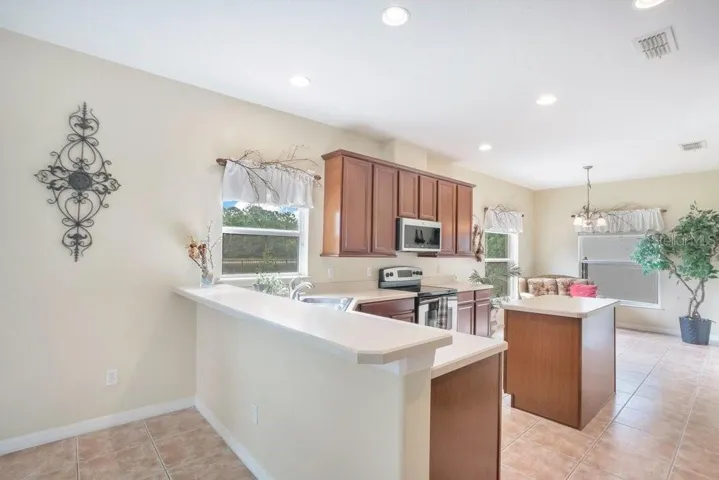 With room for counter-height seating, the Breakfast Bar is a great place for quick meals or gathering with friends.