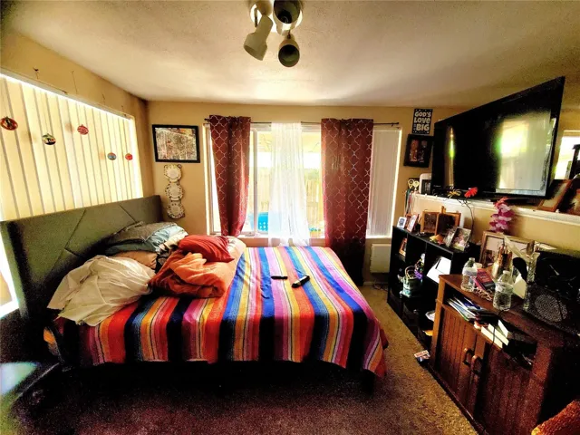 DINING ROOM (USED AS BEDROOM HERE)