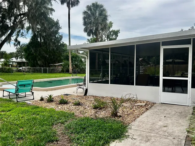 side gates on both side of the house for easy entry to pool or add'l parking