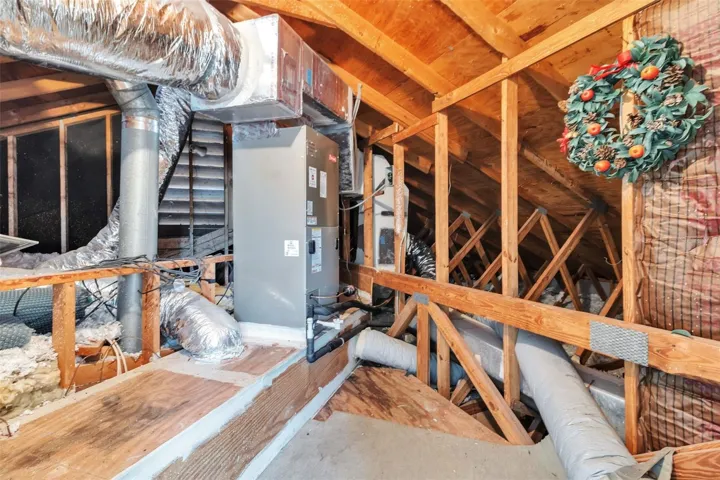 Storage in Attic Space off the 4th Bedroom.