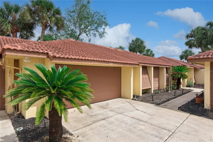 Front exterior with walkway to door