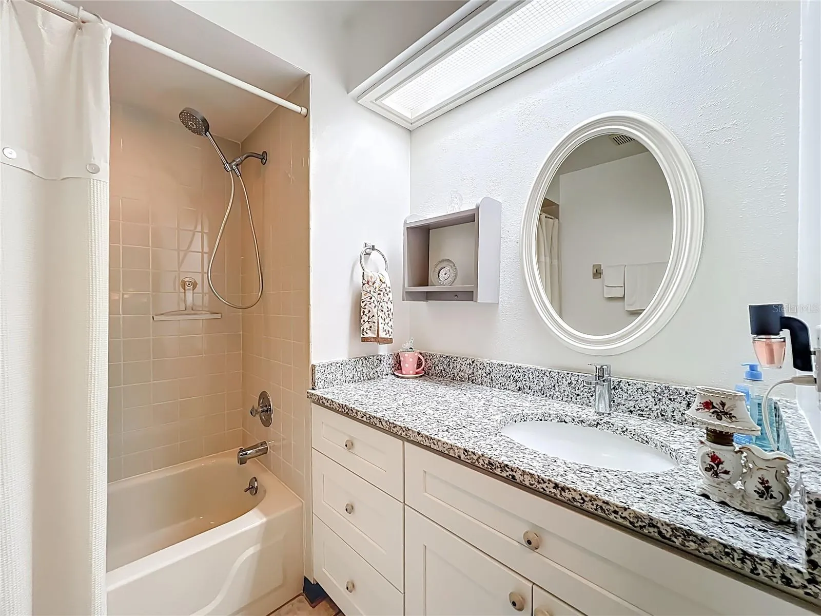 Full second bath with updated vanity.