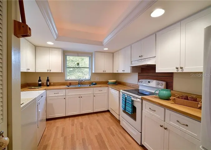 original picture with washer and dryer in kitchen