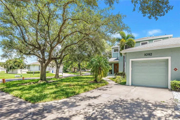 Private Townhome location on 53x125 Lot with Fenced Grassy Backyard