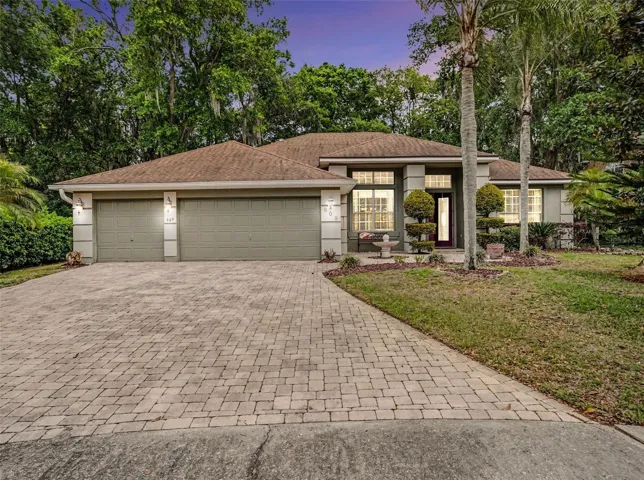 Exterior front with 3 car garage