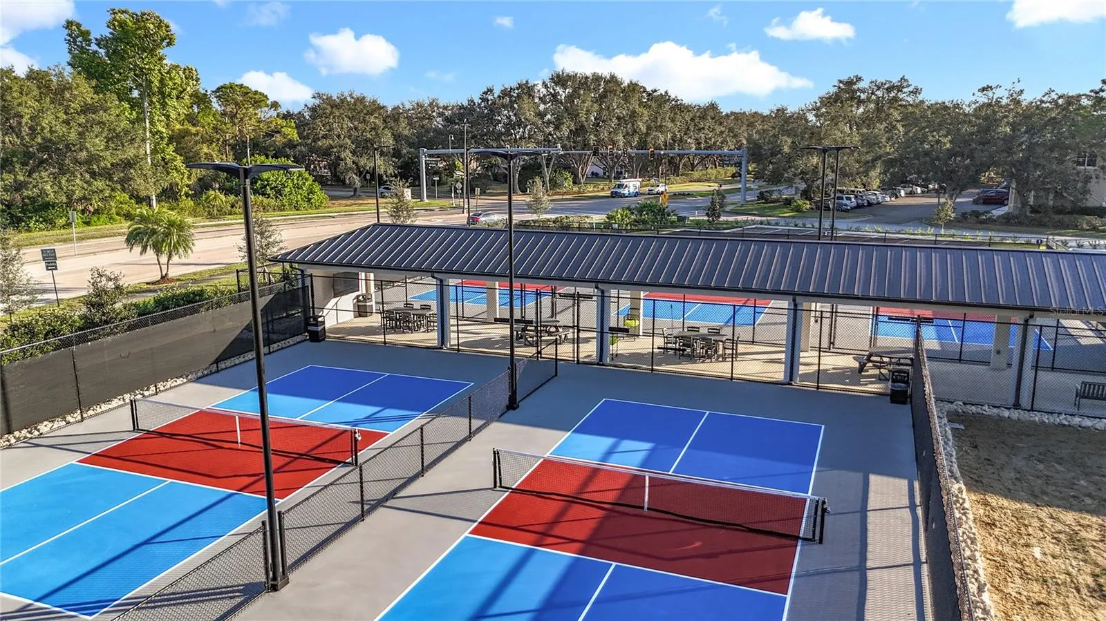Ample parking for cars, golf carts and bicycles at the pickle ball center