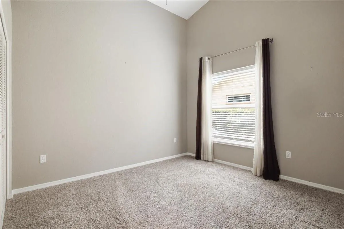 Bedroom two has pocket door to both bedroom and bath two for privacy