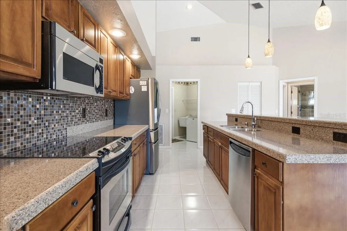Laundry room and garage access at back of kitchen