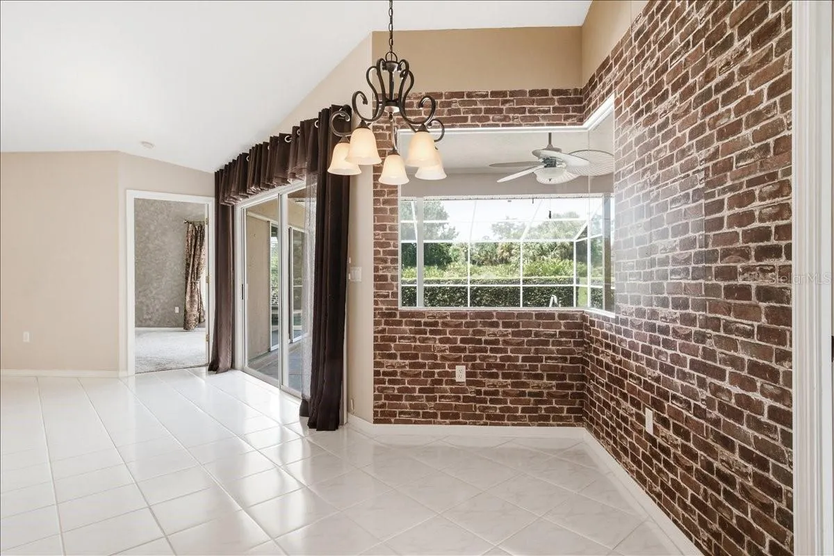 Breakfast nook with brick wallpaper create European bistro atmosphere