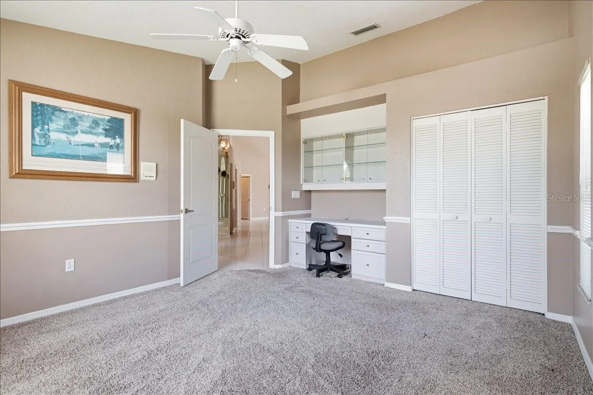 Bedroom three features built-in desk and storage