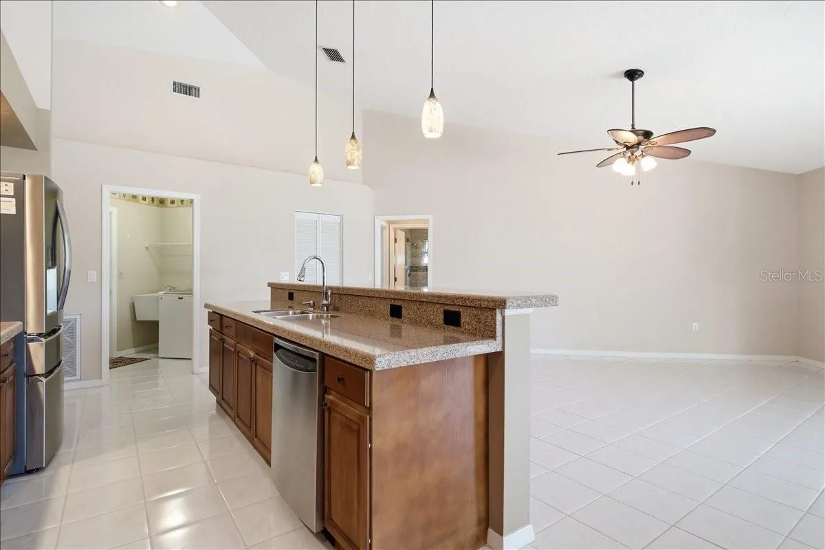 View from breakfast nook to kitchen and Den