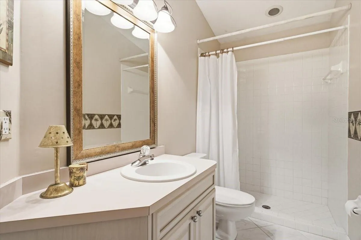Bathroom three on opposite side of home
