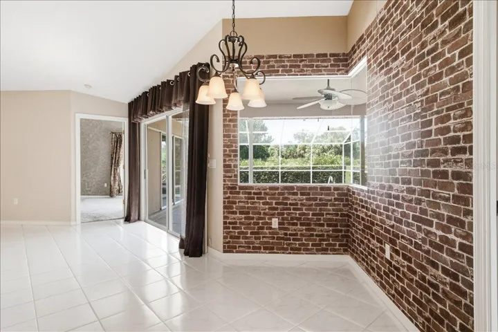 Breakfast nook with brick wallpaper create European bistro atmosphere