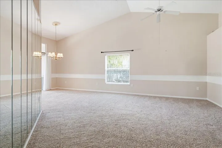 View from entry through living room, and into dining room