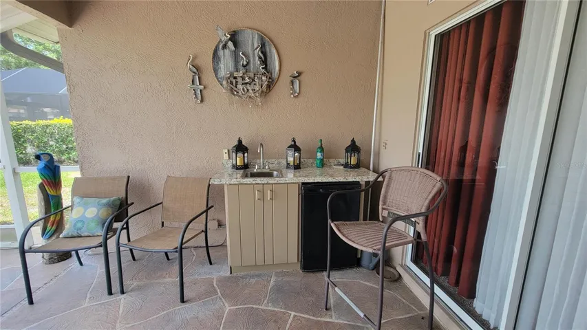 Also includes a wet bar and bar fridge