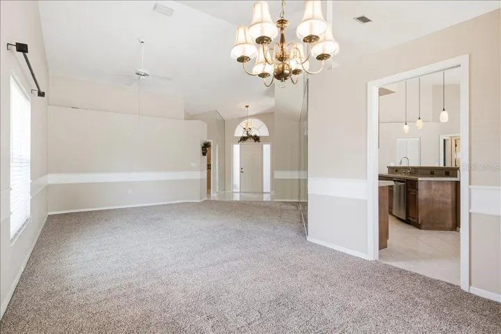 Reverse view from dining room through living room