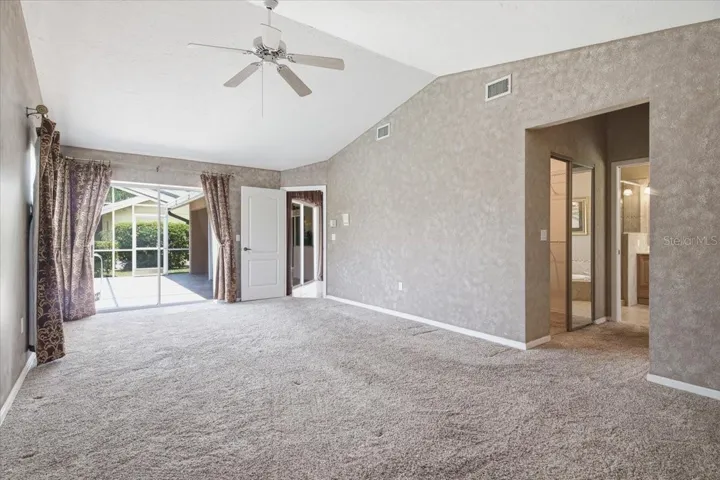 Primary bedroom also has sliders to lanai