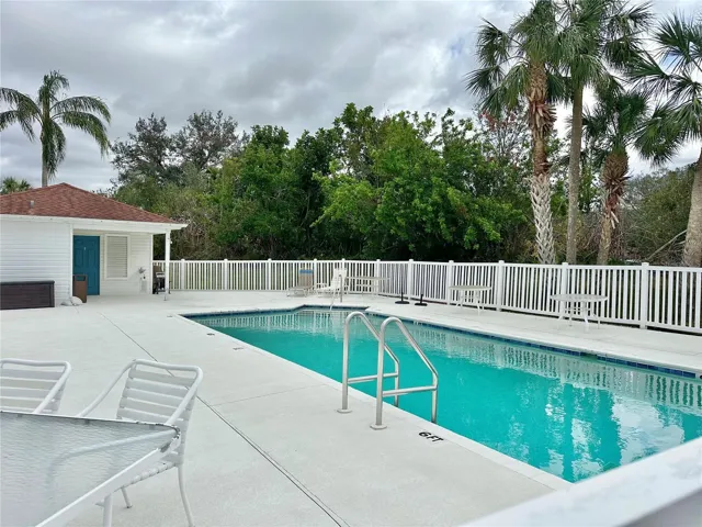 Community pool steps away