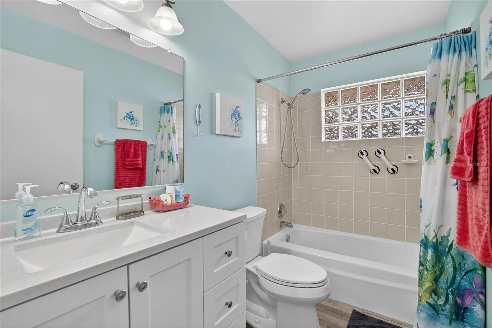 Updated guest bathroom with tub and shower