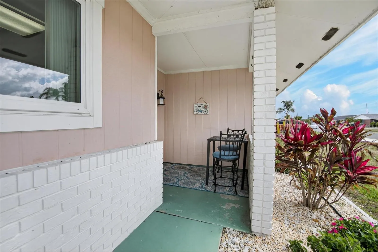 Enjoy the front porch with an early morning coffee, afternoon iced tea or a glass of wine