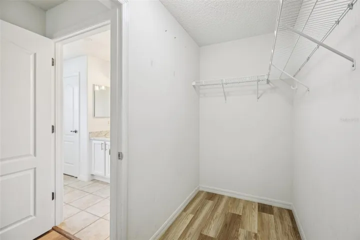 Primary suite walk-in closet.