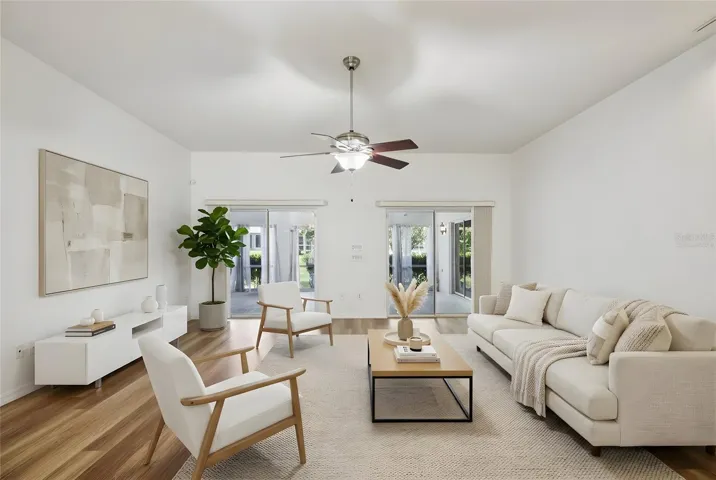 Living room has a wall of sliding glass doors for the ultimate in indoor/outdoor living. Virtually Staged.