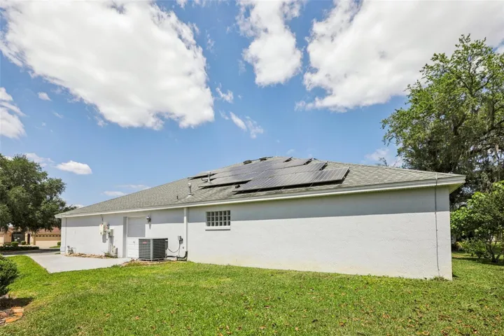 Owned solar panels / Golf cart garage.