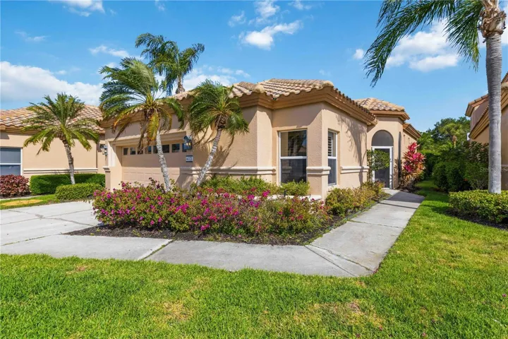 Welcome to effortless Florida living in the highly sought-after Mira Lago at Palmer Ranch